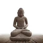 Una estatua de una persona meditando